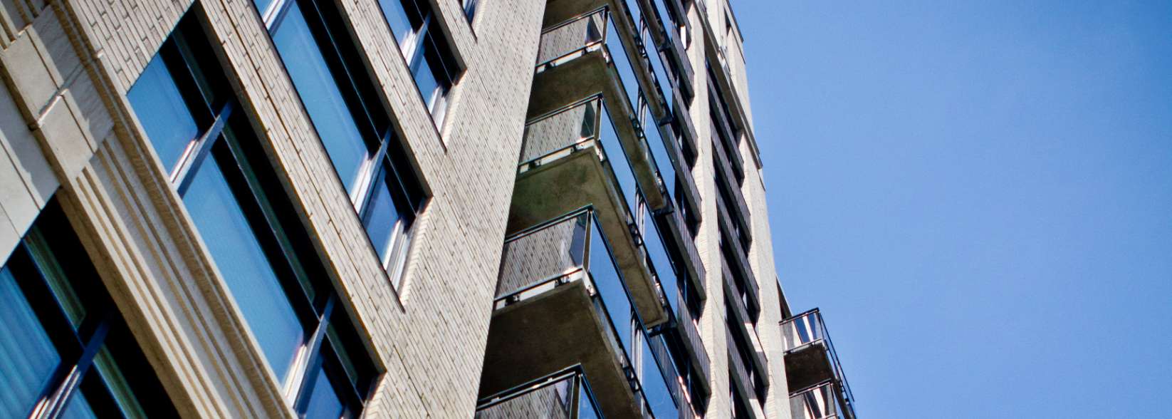 High-rise building showcasing Dilfo mechanical contracting for advanced HVAC system upgrades.