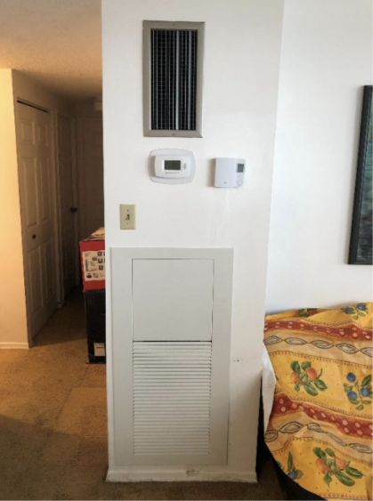 Residential hallway featuring upgraded HVAC components from a professional mechanical contracting service.